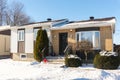 House built in 1985 in snow, Montreal, Royalty Free Stock Photo