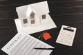 house buying concept with contract, keys, calculator and maquette over Royalty Free Stock Photo