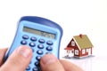 House and calculator in hand. Royalty Free Stock Photo