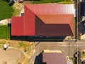 A house with a canopy over the courtyard. Roof from corrugated metal profile. Metal tiles. Royalty Free Stock Photo