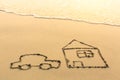 House and a car drawn on the sea beach. Travel. Royalty Free Stock Photo