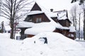 House and car under snow in the Tatra mountain village Polish Royalty Free Stock Photo