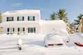 House and cars after snowstorm