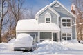 House and cars after snowstorm Royalty Free Stock Photo