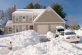 House and cars after snowstorm Royalty Free Stock Photo
