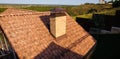 House with ceramic tile roof. cement-sand roof tiles