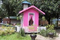 a house for children to play in the flower garden