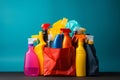 House cleaning and disinfecting supplies on bright background for home tidying up