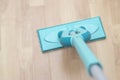 house cleaning - mop washing wooden floor. Wet cleaning concept background. Royalty Free Stock Photo