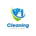 House Cleaning Service Logo. Broom isolated on shield shape Royalty Free Stock Photo