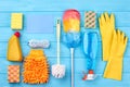 House cleaning set on wooden background. Royalty Free Stock Photo