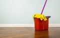 House cleaning tools on parquet Royalty Free Stock Photo