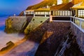 House on a cliff on sunset, Portugal. Royalty Free Stock Photo