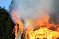 House completely engulfed in flames