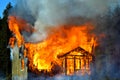 House completely engulfed in flames Royalty Free Stock Photo