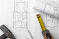 House construction plan. Hammer and measuring cup. copy space Royalty Free Stock Photo