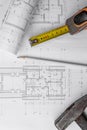House construction plan. Hammer and measuring cup. copy space Royalty Free Stock Photo