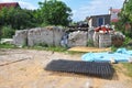House construction site with building consctruction garbage and stack of bricks Royalty Free Stock Photo
