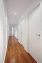 House corridor with white walls and parquet Royalty Free Stock Photo