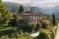 House or cottage in the middle of summer with a beautiful garden and swimming pool in Tuscany. The place is romantic and makes you Royalty Free Stock Photo