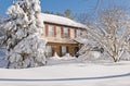 House covered in winter snow