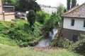 House on the Creek Bank in Alsace Royalty Free Stock Photo