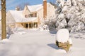 House in deep winter snow