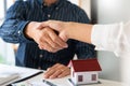 House developers and customer shaking hand after accept agreement finish buying or rental real estate for transfer right of Royalty Free Stock Photo