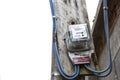 House Electricity meter installed on electricity pole over blurred background