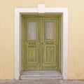 House entrance green door with white frame, Athens Greece. Royalty Free Stock Photo
