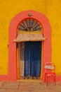 A beautiful colourful House Entrance at the seaside waterfront fishing village of Marsaxlokk, Malta Royalty Free Stock Photo