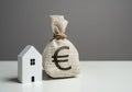 House and euro money bag. House price, property valuation.