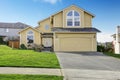 House exnterior with garage. View from driveway Royalty Free Stock Photo