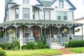 House with exquisite wood carvings. Porch decorated with wood lace