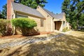 House exterior. Front yard with dry grass and concrete tile walk Royalty Free Stock Photo