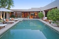 House exterior with pool at dusk Royalty Free Stock Photo