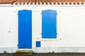 House facade with blue blinds and door Royalty Free Stock Photo