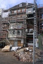 House facade with scaffolding, renovation and reconstruction of an old villa in Hamburg, Germany