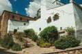 House facade with white walls, stairs, flower pots and plants at Caceres Royalty Free Stock Photo