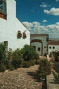 House facade with white walls, stairs, flower pots and plants at Caceres Royalty Free Stock Photo