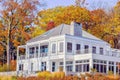 House with Fall Colored Foliage Royalty Free Stock Photo