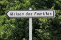 House of families called maison des familles road sign in French language Royalty Free Stock Photo