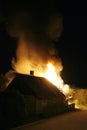 A house in fire in the middle of the night Royalty Free Stock Photo