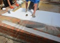 House floor layers construction with waterproofing membrane, styrofoam insulation and sewer pipes