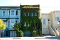 House with flora all on its walls, near the residential neighborhood and park of Alamo Square in San Francisco, California, USA Royalty Free Stock Photo