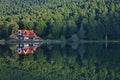 House at the forest lake reflection Golcuk, Turkey Royalty Free Stock Photo