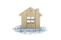 House with a foundation on a hundred dollar bill. toy house with a roof costs money. Concept: mortgage, purchase, sale of real Royalty Free Stock Photo