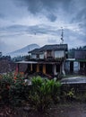 A house in front of a mountain vilage