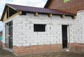 House garage under construction. Building construction new house garage from aerated concrete blocks with metal roof Royalty Free Stock Photo