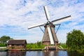 Traditional Dutch windmill with its house Royalty Free Stock Photo